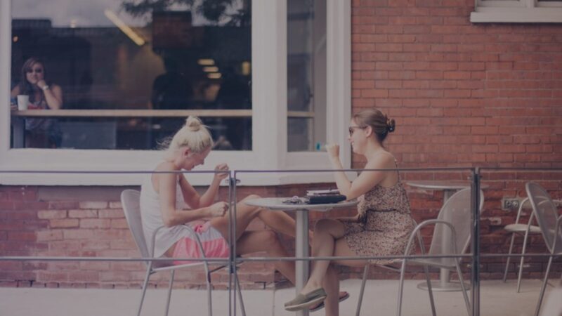 two ladies having coffee