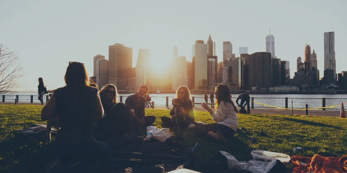 group sitting on a lawn