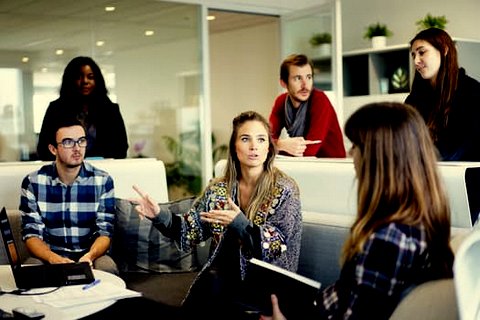 woman communicating in a meeting