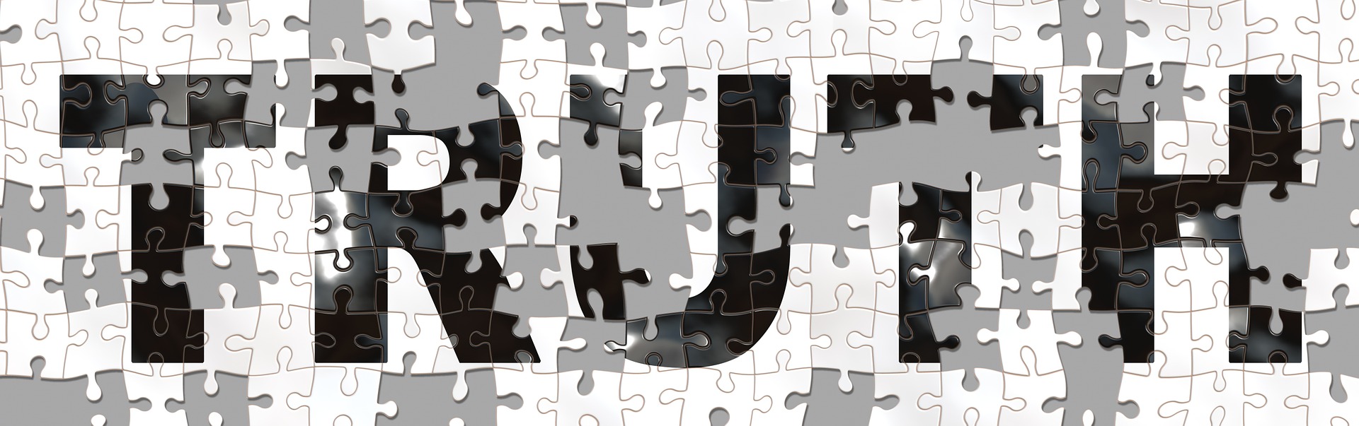 Puzzle pieces forming the word 'truth' in bold black letters on a contrasting white background.