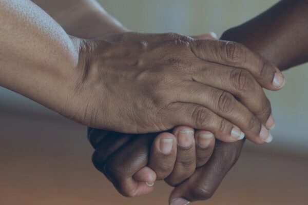 two people holding hands