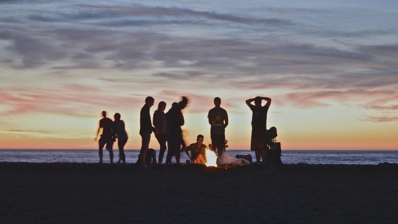 people around a campfire