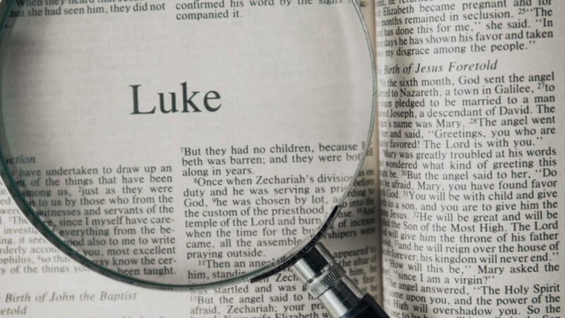 Bible opened to the Gospel of Luke