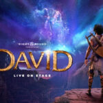 David live on stage poster by Sight & Sound Theatres with a cosmic backdrop and a warrior figure.