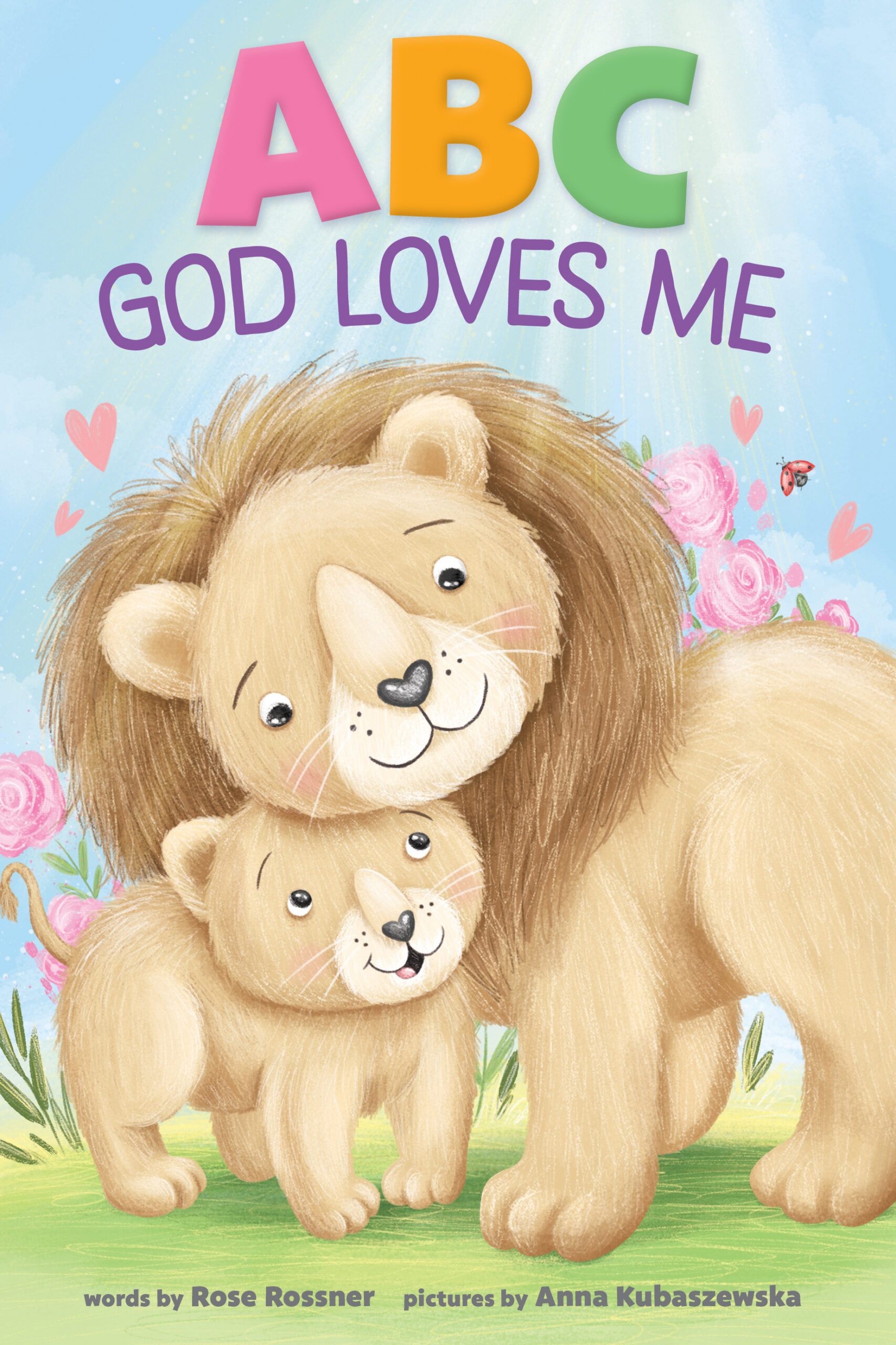 Illustrated cover of ABC God Loves Me featuring a smiling lion and cub with hearts and flowers.