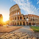 Colosseum in Rome and morning sun, Italy