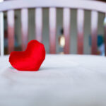 Heart in baby's crib